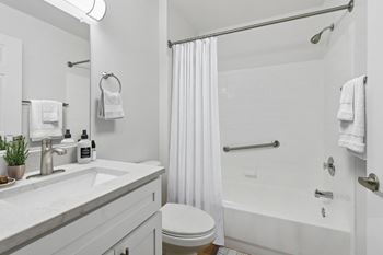 Clean bathroom with white fixtures